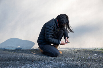 young woman always pending the mobile