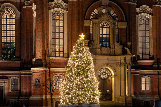 Christmas time with a big Christmas tree in front of St. Michael's church in Hamburg