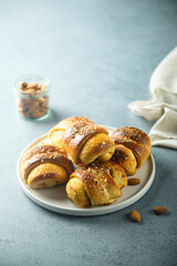Homemade pumpkin buns with almond and jam