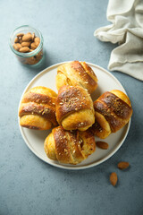 Homemade pumpkin buns with almond and jam