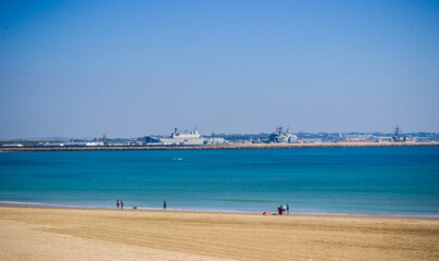 Fototapeta na wymiar Rompidillo beach in Rota with view for the American naval base in Andalusía Spain.