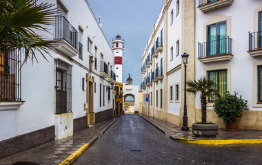 Fototapeta na wymiar Puerta del Mar Sea Door with view to Rota lighthouse. Andalusia Spain