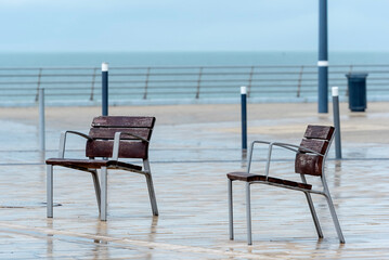  chairs on the  empty beach