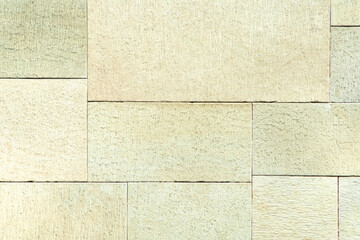 Wall background in green and yellow tone. Brick wall texture.