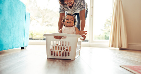 Cute family playing together at home