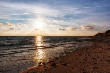 Fototapeta na wymiar sunset over empty beach