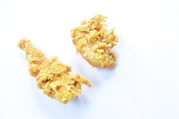 crispy fried chicken meat with bread crumb and egg yolk on white background