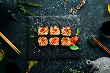 Baked sushi with eel and caviar. Seafood. Top view.