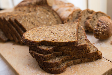fresh loaf of bread on wooden board