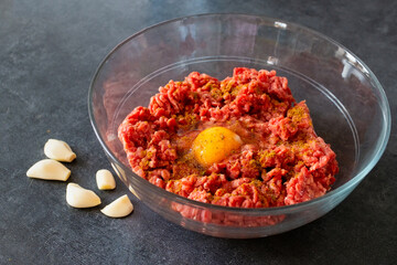 Raw minced meat in bowl