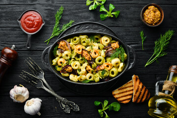 Italian cuisine. Ravioli with onions and mustard. Top view. Free space for your text. Rustic style.