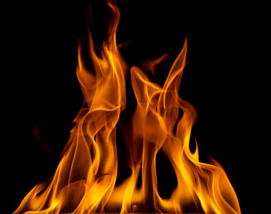 The flame were burning, the heat was hot, Black background