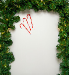 Christmas decor with lights and candy cane - background