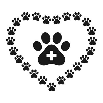 veterinary logo dog paw in heart with medical cross on white background