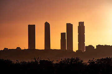 Fototapeta na wymiar Golden sunrise over downtown Madrid