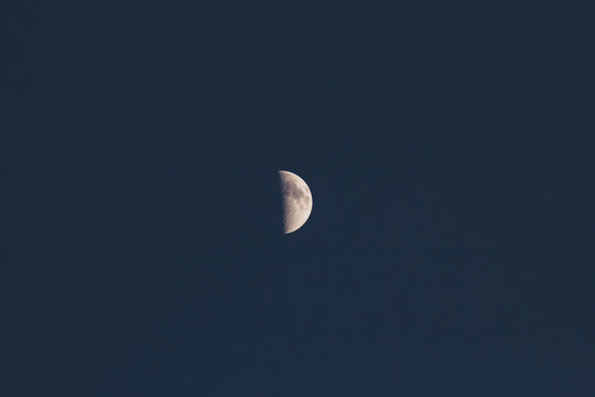 Horizontal photo of semicircular moon
