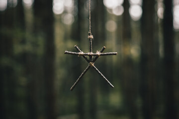 Wooden symbol of tree branches. Ancient occult symbols. Occultism and mysticism. Selective focus.
