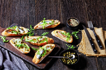 anchovy butter sandwiches with capers and arugula