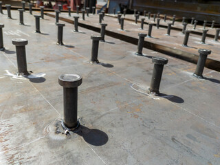 Welding stud bolt on the steel plate.