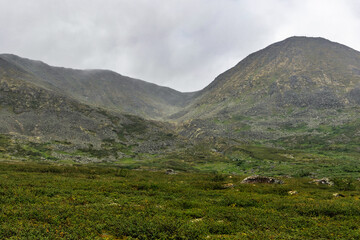 Obraz premium mountain range in the clouds on a cloudy day