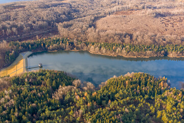 Fototapeta na wymiar Hungary - Matra mountains with Csori-reti water reservoir from drone view