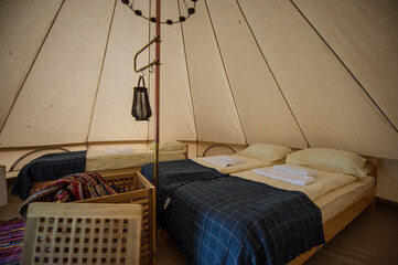 Glamping site in the woods on a calm afternoon.