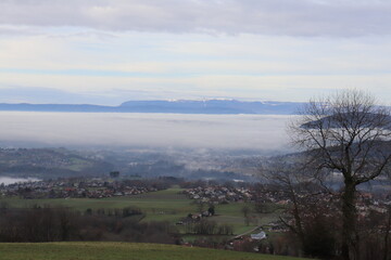 Fototapeta na wymiar Mer de nuages sur le village de Villaz, ville de Villaz département de Haute Savoie, France