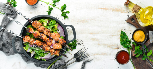 Juicy chicken skewers with rosemary and spices. Top view. Barbecue.