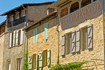 Colourful window shutters, France