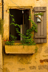Fototapeta na wymiar Colourful window shutters, France