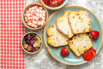 top view yummy cake slices with fresh strawberries on the white background sweet pie fruits cake