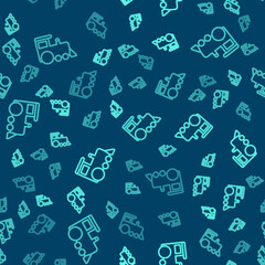 Green line Toy train icon isolated seamless pattern on blue background. Vector.