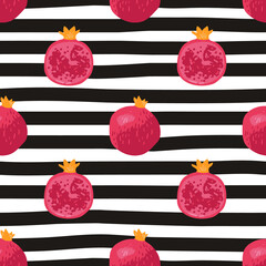 Vector seamless summer pattern with pomegranates on black and white striped background.