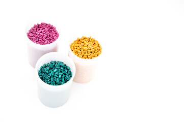 Plastic granules close up for holding,Colorful Plastic granules with white background.