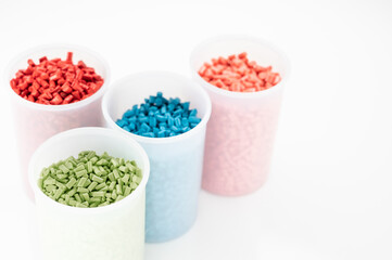 Plastic granules close up for holding,Colorful Plastic granules with white background.