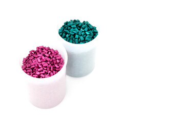 Fototapeta na wymiar Plastic granules close up for holding,Colorful Plastic granules with white background.