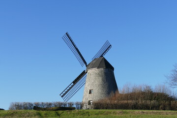 Fototapeta na wymiar historic windmill in Germany, Europe against blue sky