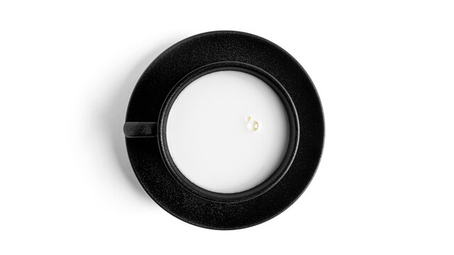 Cup with milk drink on a plate on a white background. High quality photo