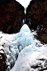 Vilyuchinsky waterfall in winter in Kamchatka