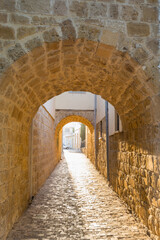 Sunset and stone arches, and old walls in Nicosia of Cyprus
