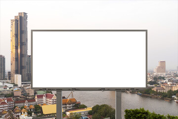 Blank white road billboard with Bangkok cityscape background at day time. Street advertising poster, mock up, 3D rendering. Front view. The concept of marketing communication to promote or sell idea.