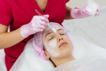 Cosmetic procedure to rejuvenate the skin and remove wrinkles for a young beautiful girl....