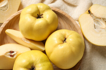 Fresh ripe organic quinces on table, flat lay