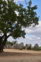 Cromlech of Almendres megalithic stone complex with cork trees in Alentejo, Portugal