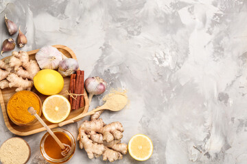 Flat lay composition with fresh products on grey table, space for text. Natural antibiotics