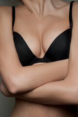 Obraz premium chest of girl in black bra