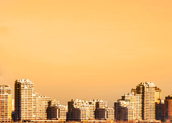 Nice view of the city and high-rise buildings at sunset