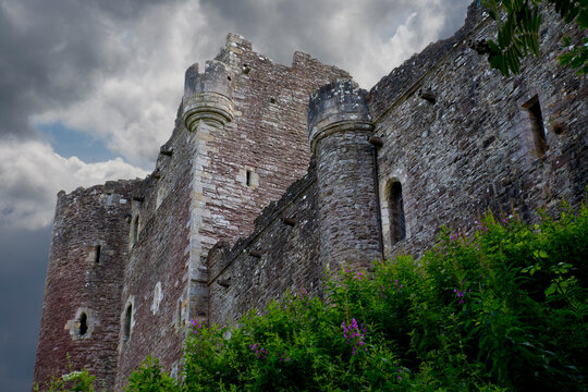 Doune Castle is a medieval stronghold near the village of Doune, central Scotland. is sited on a wooded bend where the Ardoch Burn flows into the River Teith. It lies north-west of Stirling. 
