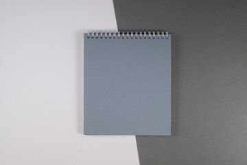 gray office notebook on white gray background