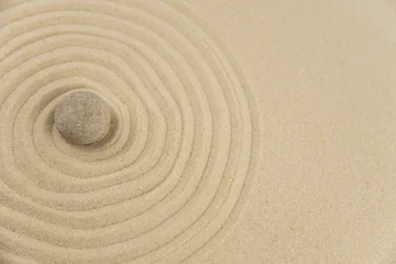 Foto op Plexiglas Stenen in het zand Zen sand garden meditation stone background with copy space. Stones and lines drawing in sand for relaxation. Concept of harmony, balance and meditation, spa, massage, relax. Set Sail Champagne color